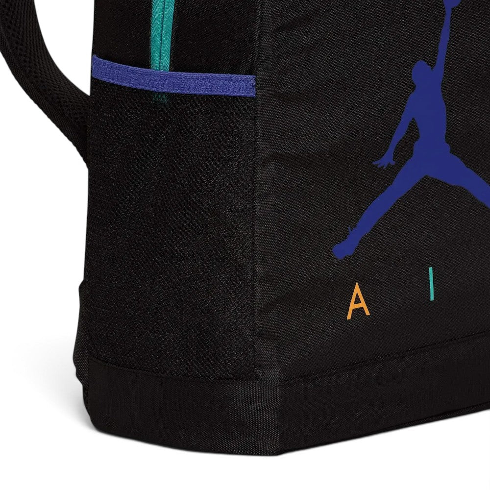 Highlights the durable black mesh water bottle pocket reinforced with a purple elasticated top rim, framing the lower half of the printed purple Jumpman and multi-coloured "AIR" logo.