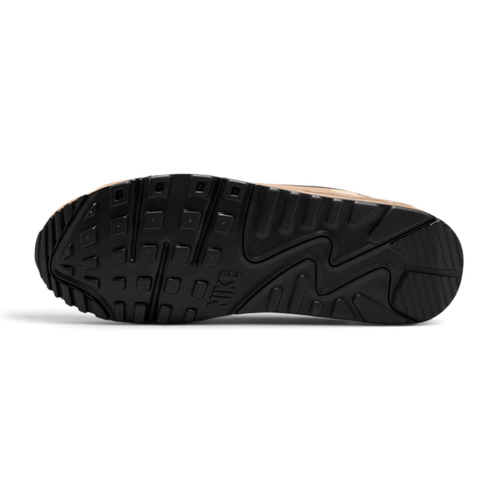 Displays the full-length black and beige rubber Waffle outsole, showcasing the iconic heritage tread lugs and multi-directional grip pods designed for reliable street-to-trail traction.