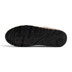Displays the full-length black and beige rubber Waffle outsole, showcasing the iconic heritage tread lugs and multi-directional grip pods designed for reliable street-to-trail traction.