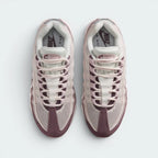Focuses on the locked-in traditional lacing layout, displaying the perfect symmetry of the white mesh tongue, the vertical webbed ribcage eyelet loops, and the airy mesh guarding the front toe box area.