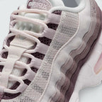 Details the premium stitching wrapping the durable front toe cap protection matrix and the neat configuration of the speed-lacing eyelet loops.