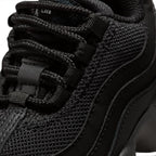 Details the micro-precision of the forefoot area, showing the fine-gauge black mesh toe box, double-stitched leather toe bumper, round laces, and heavy-duty ribbed eyelet straps.