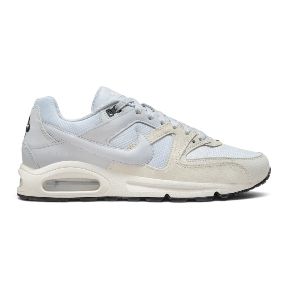 Highlights the lateral profile showing the Pure Platinum upper mesh, off-white suede toe mudguard, light grey leather midfoot overlay with matching Swoosh, debossed "AIR MAX" quarter text, and a visible Max Air heel window.
