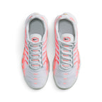 Focuses on the locked-in central lacing layout, displaying the flat white laces, padded mesh tongues with pink-bordered Nike Air hex badges, cushioned collars, and grey insoles.