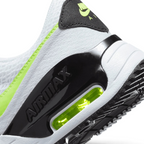 Highlights the "unreal" clean finish where the thick foam cushioning carrier meets the durable rubber traction base, framing the clear heel Air pocket.