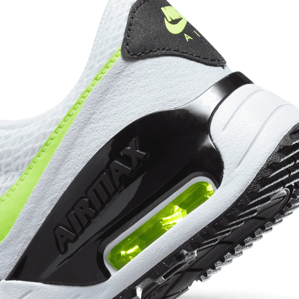 Highlights the "unreal" clean finish where the thick foam cushioning carrier meets the durable rubber traction base, framing the clear heel Air pocket.
