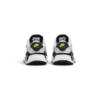 Focuses on the contoured shape of the padded low-cut collar, highlighting the structured black heel cup sitting squarely above the translucent Air heel unit.