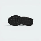 Displays the classic waffle-inspired traction blueprint of the durable rubber outsole, showcasing the multi-surface tread pattern engineered for unreal everyday grip.