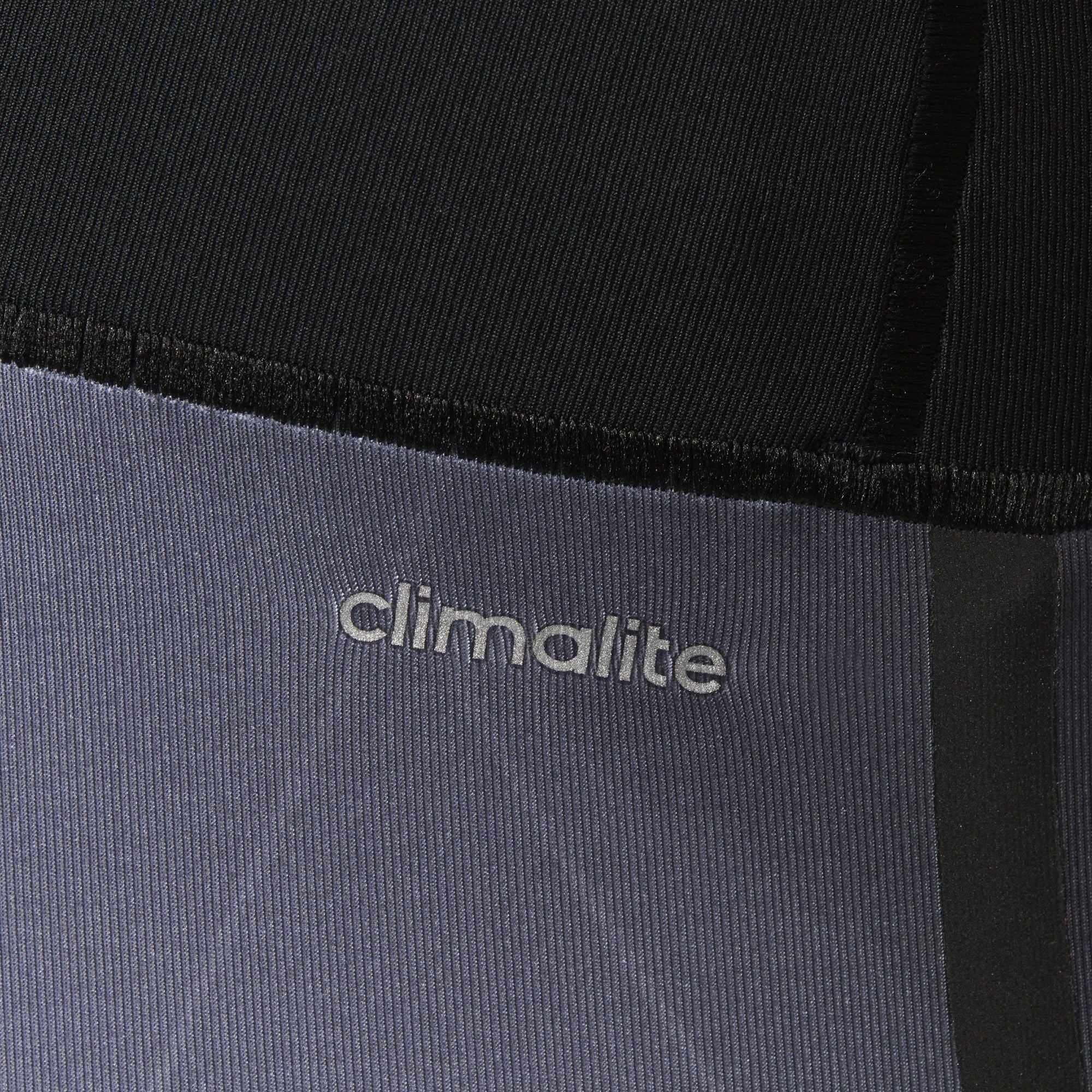 Highlighting the "unreal" precision of the heat-transferred climalite logo on the hip.