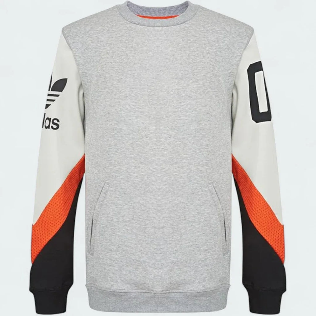 Adidas Crew Basketball Sweatshirt in grey fleece, front view showing ribbed crewneck, cuffs, and hem, with a subtle Adidas logo.