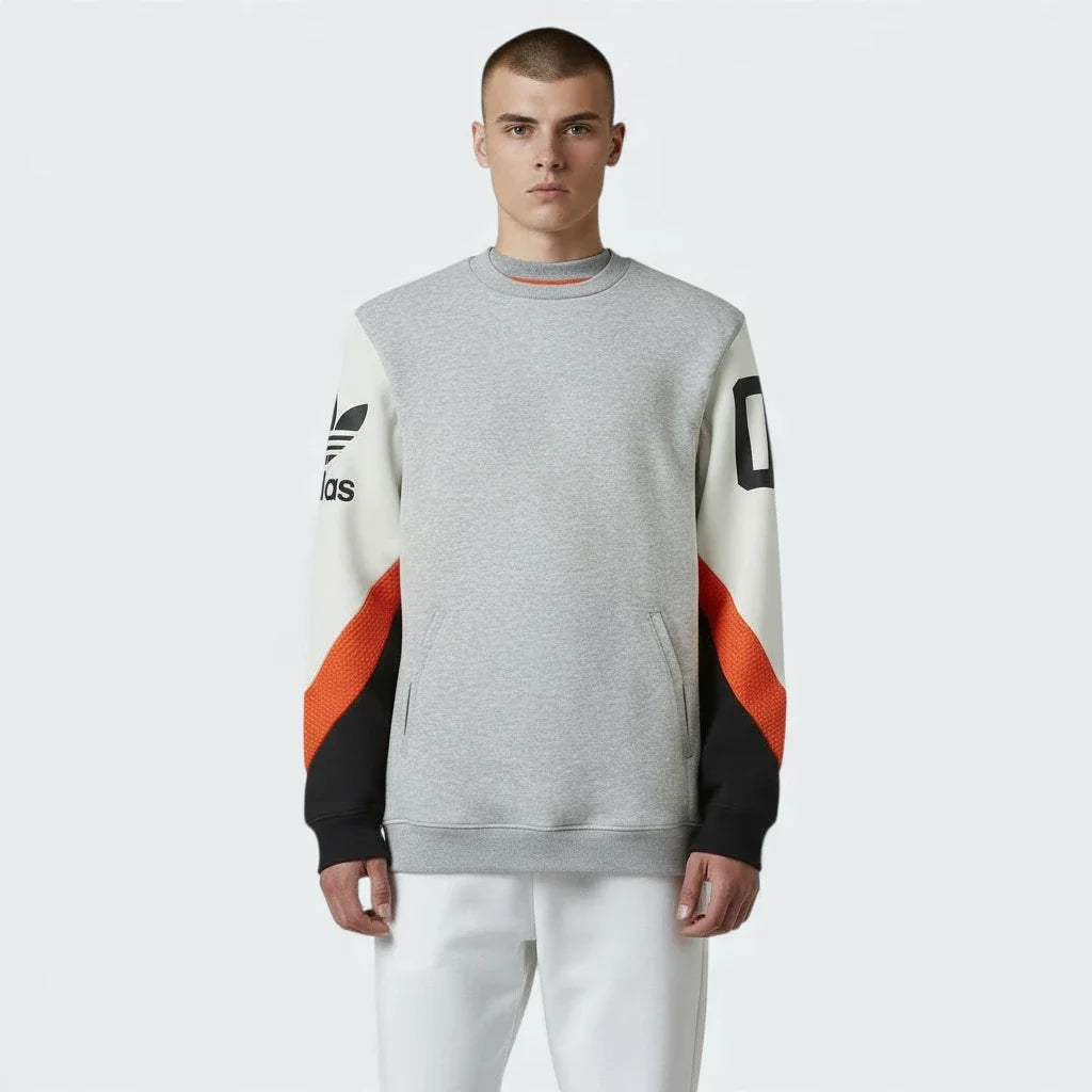 Adidas Crew Basketball Sweatshirt in grey fleece, front view showcasing the plain design and comfortable fit.