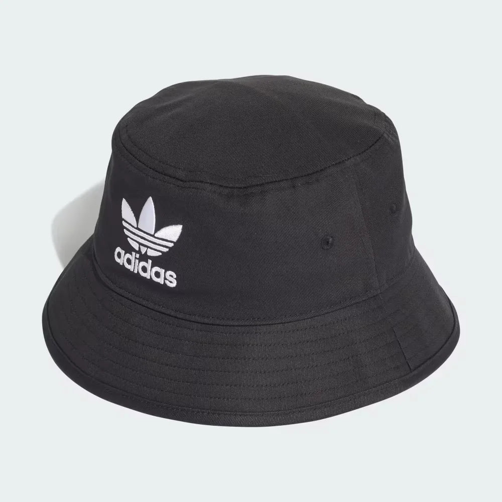 The Black Trefoil Bucket Hat, highlighting the downward-sloping brim and the reinforced stitching around the crown.