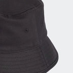 Highlighting the rows of decorative and structural stitching on the flexible brim.