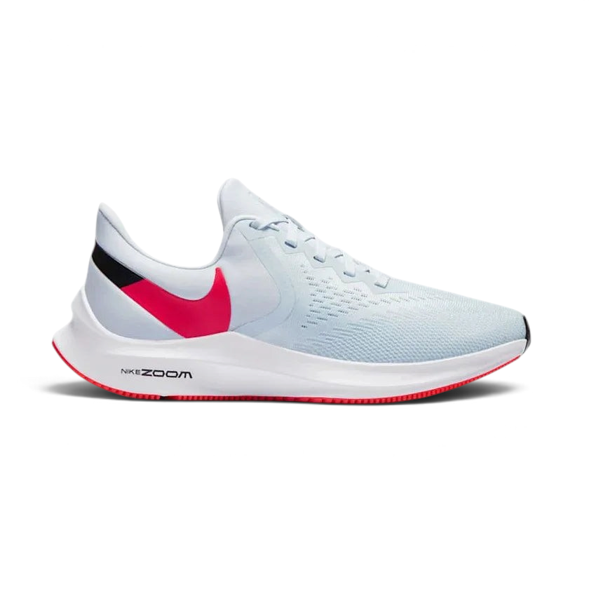 Nike Zoom Winflo 6 Women's running trainers in blue with red and black accents, side profile showing mesh upper, Zoom Air cushioning, and Nike Swoosh.
