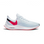 Nike Zoom Winflo 6 Women's running trainers in blue with red and black accents, side profile showing mesh upper, Zoom Air cushioning, and Nike Swoosh.