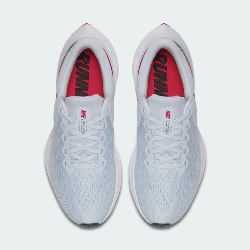 Top-down view of a pair of Nike Zoom Winflo 6 Women's running trainers in blue, highlighting their streamlined silhouette and lace-up closure.