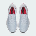 Top-down view of a pair of Nike Zoom Winflo 6 Women's running trainers in blue, highlighting their streamlined silhouette and lace-up closure.