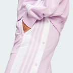 Emphasising the loose, wide-leg cut and the functional breakaway side panels.