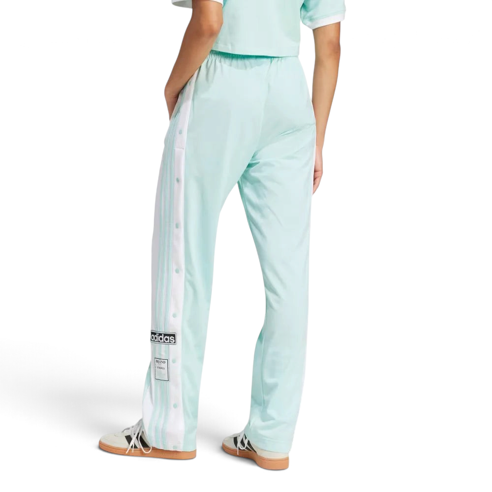 Focusing on the clean athletic drape and the way the fabric stacks over low-profile sneakers.