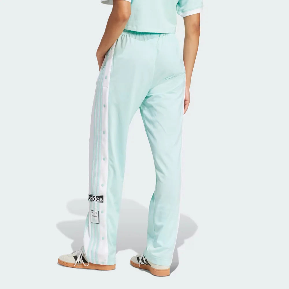 Focusing on the clean athletic drape and the way the fabric stacks over low-profile sneakers.