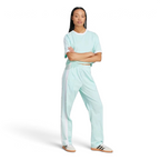 Person wearing a light blue tracksuit with white stripes on a white background