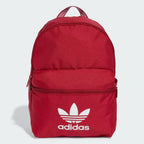 Red Adidas backpack on a light gray background