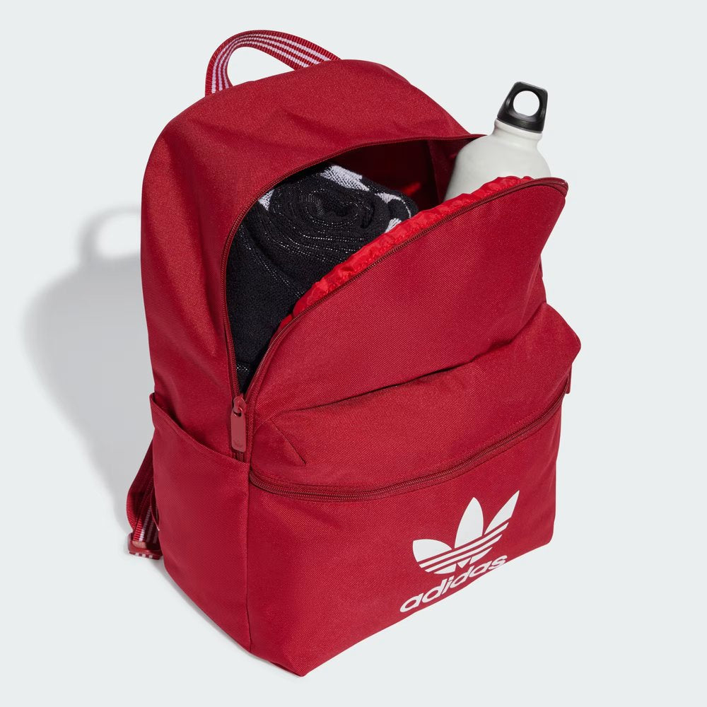 Zoom looking at the front zip pocket and side pockets, highlighting the easy-access storage for daily essentials.