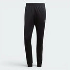 Focuses on the locked-in stretch of the gathered elastic waistband and the clean finish of the adjustable drawstrings.