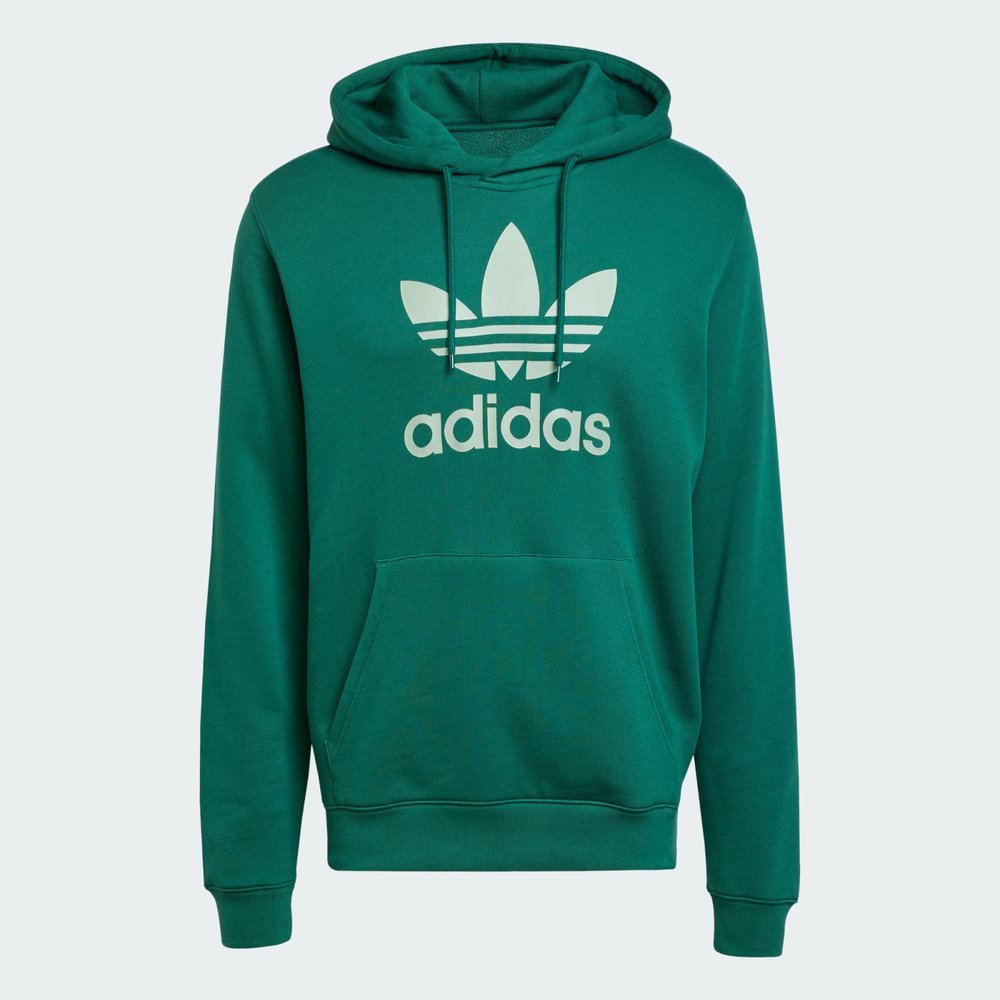 Top-down view of the hoodie laid flat, highlighting the oversized white Trefoil logo and the drawcord-adjustable hood.