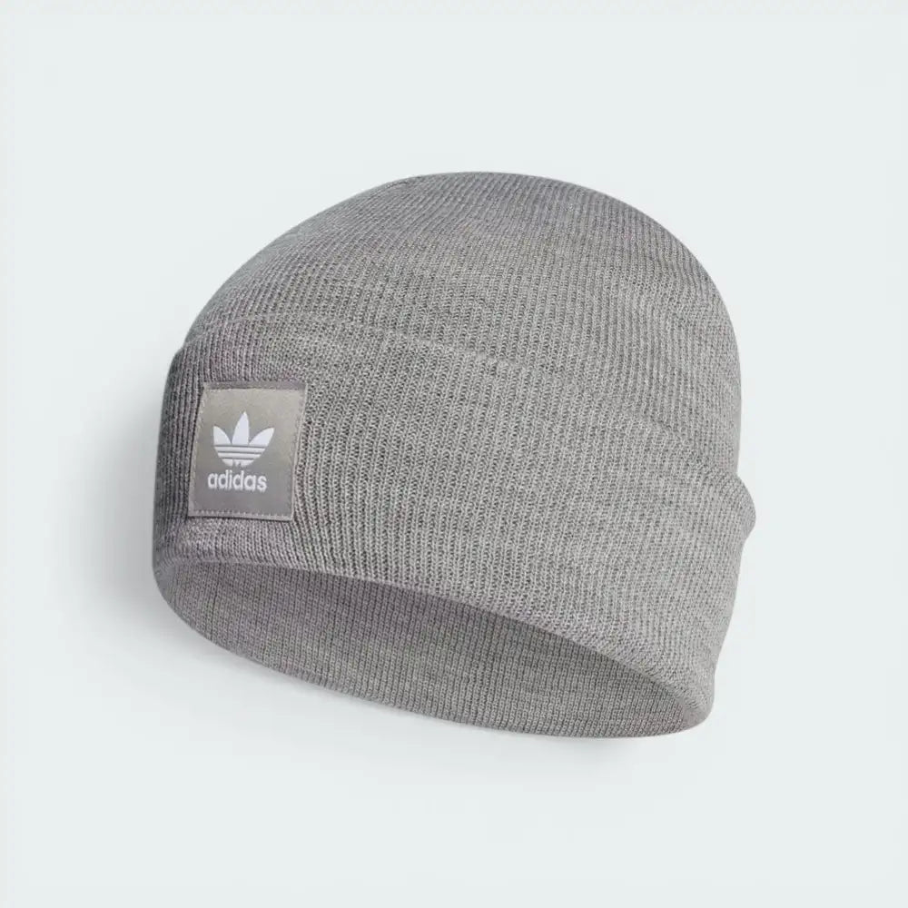Side profile of the Medium Grey Heather beanie, highlighting the folded cuff and the textured rib-knit pattern.