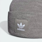 Zoom looking at the Trefoil patch, showcasing the precision of the embroidery and the signature Adidas branding.