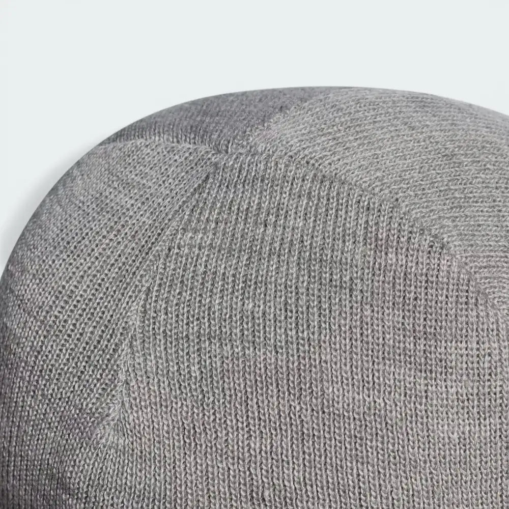 Top-down view of the beanie, showcasing the structured top seam and the circular construction.