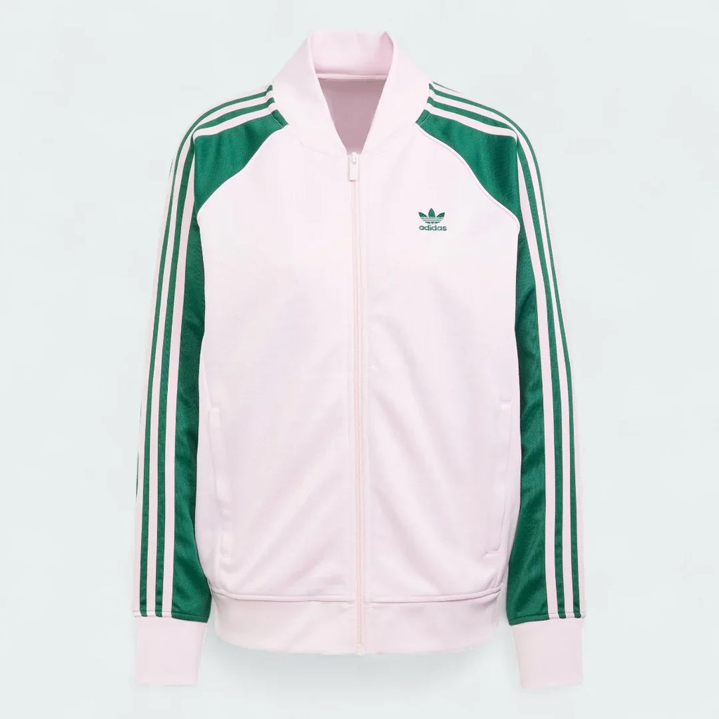 Adidas Adicolor Classics Loose Superstar Track Jacket Women's in clear pink, front view showing the loose fit, full zip, ribbed bomber collar, and embroidered Trefoil logo.