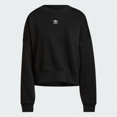 Adidas Adicolor Essentials Fleece Crew Sweatshirt Women's in black, front view showing the ribbed crewneck, cuffs, and hem, and a small Adidas Trefoil logo on the chest.
