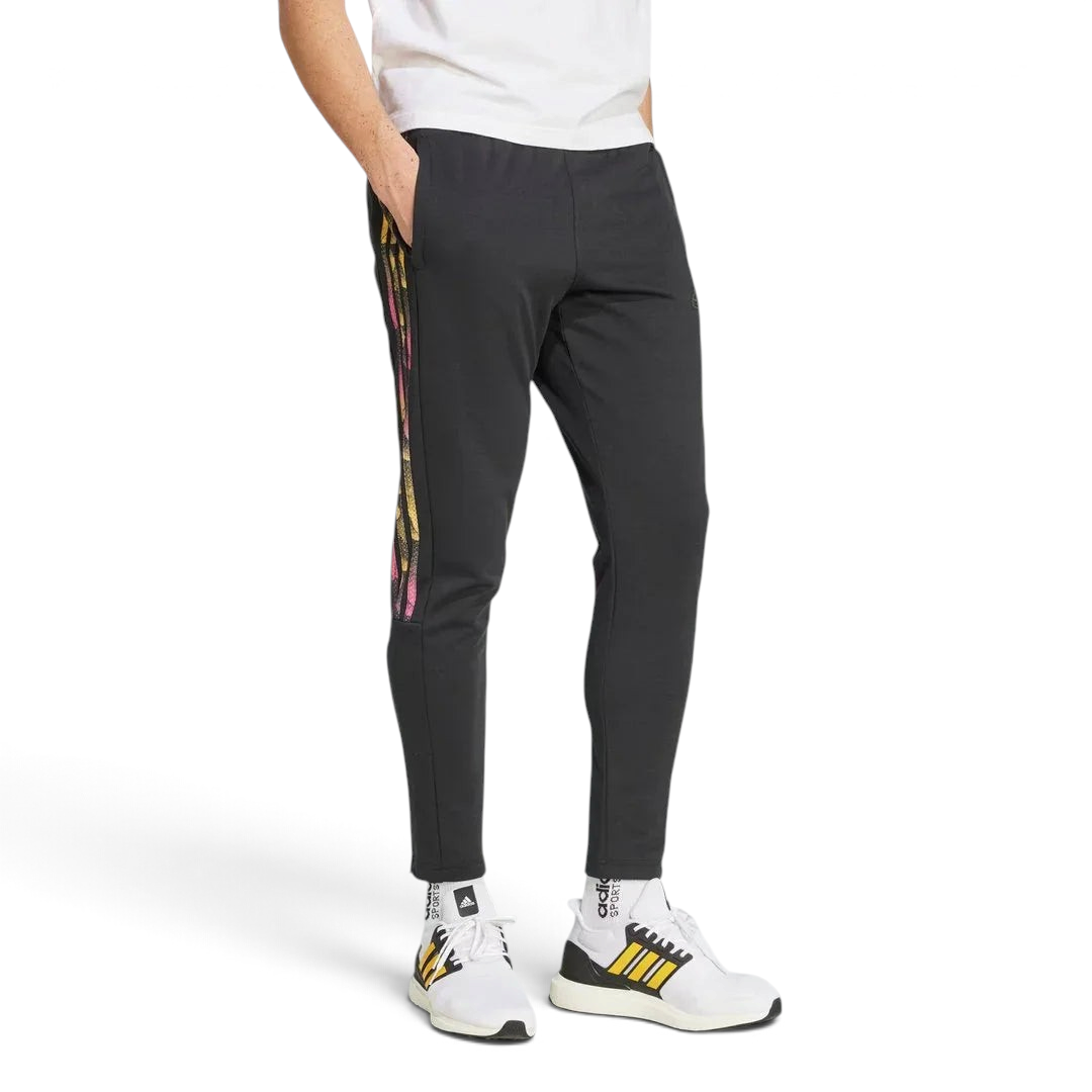 Adidas Tiro Running Track Pants in black, front view showing the tapered leg, elastic drawcord waist, and front zip pockets. Main image