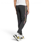 Adidas Tiro Running Track Pants in black, back view showcasing the clean design and tapered fit.