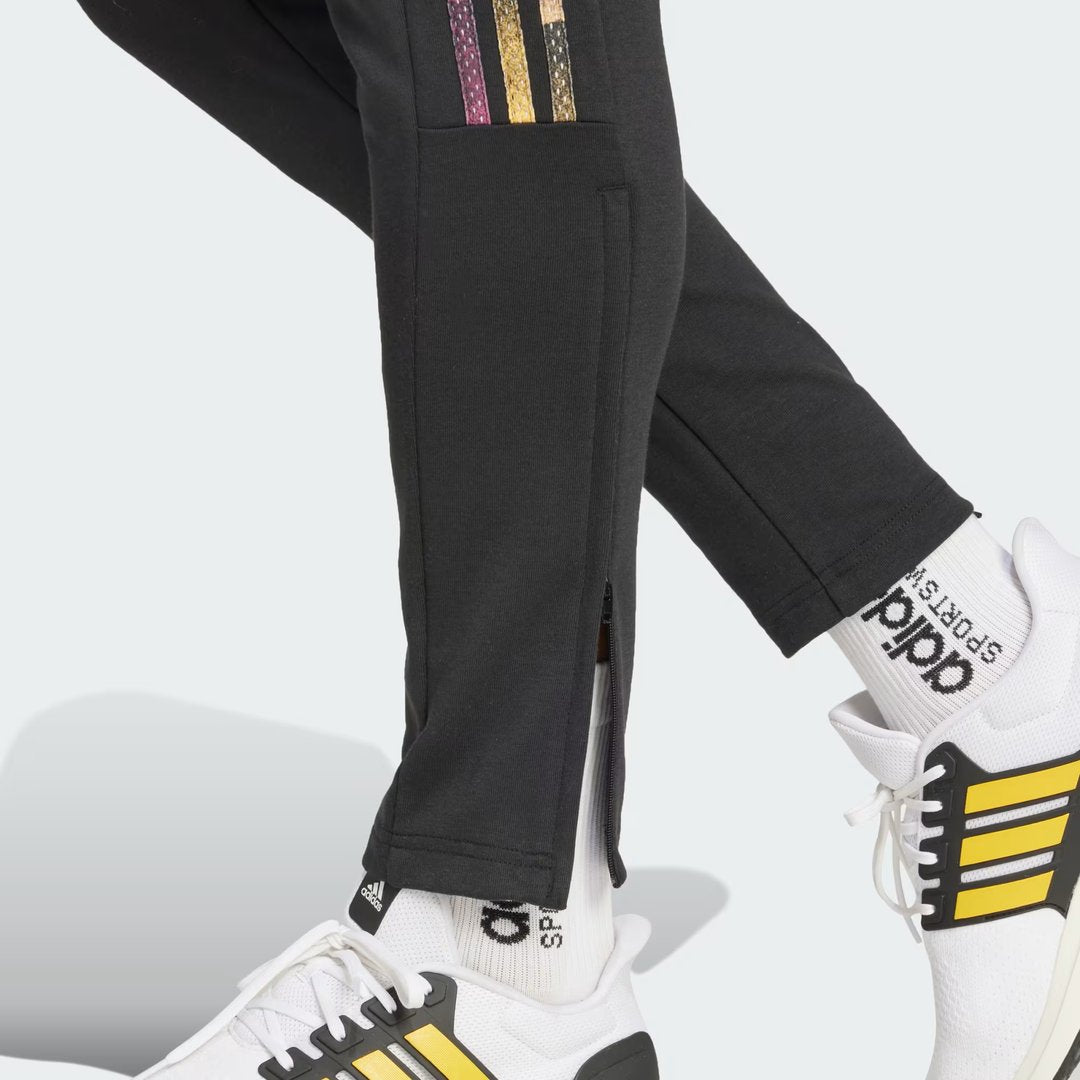 Detailed zoom on the ankle zips of the Adidas Tiro Running Track Pants, highlighting the adjustable fit and functional details.