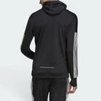 Focuses on the clean lines of the longer hem and the professional finish of the stitching.