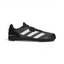 Highlights the high-velocity white adidas branding and the professional, flat profile of the zero-drop sole layout.