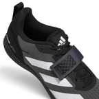 Details the high-definition space of the roomy toe box and the precision of the protective toe overlay.