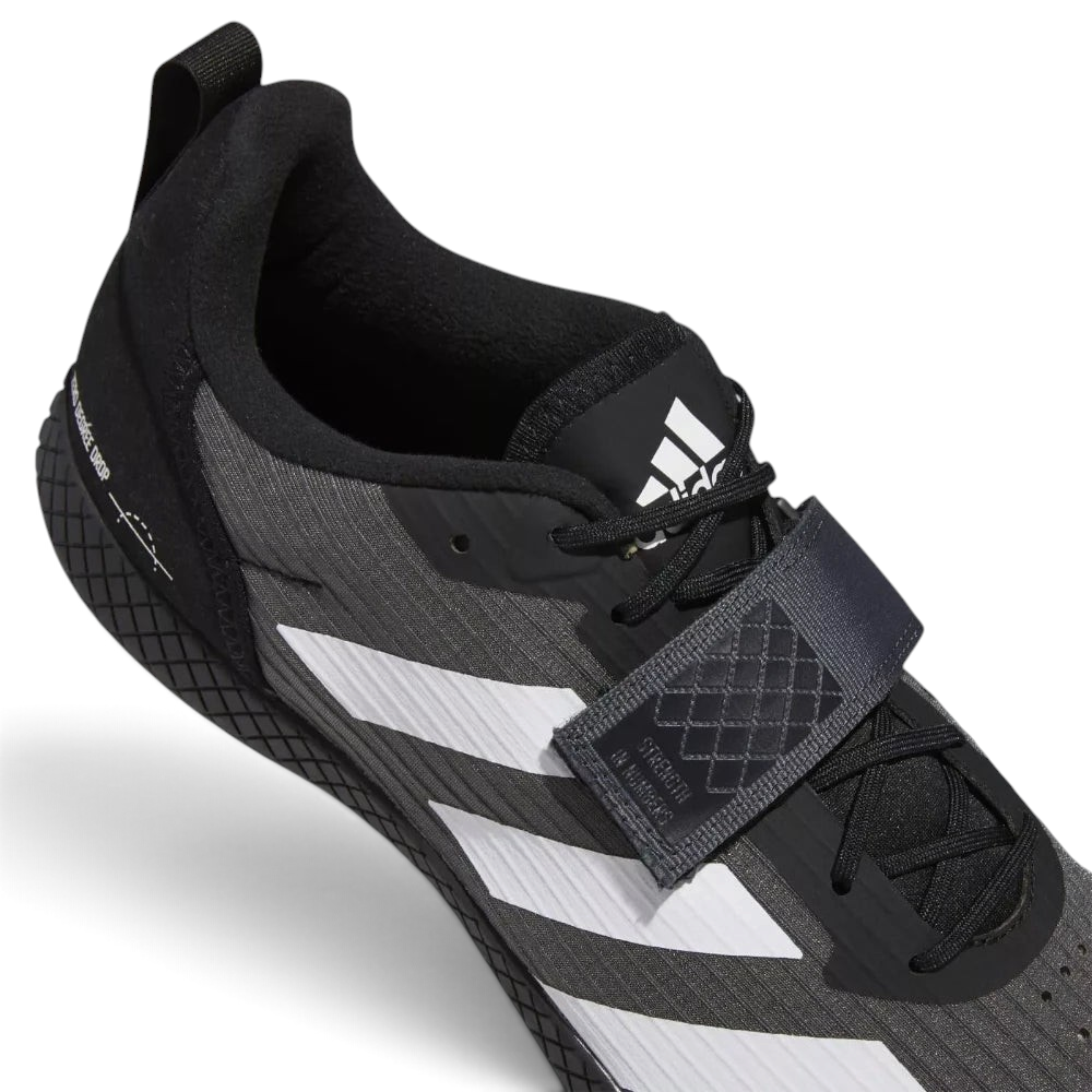 Details the high-definition space of the roomy toe box and the precision of the protective toe overlay.