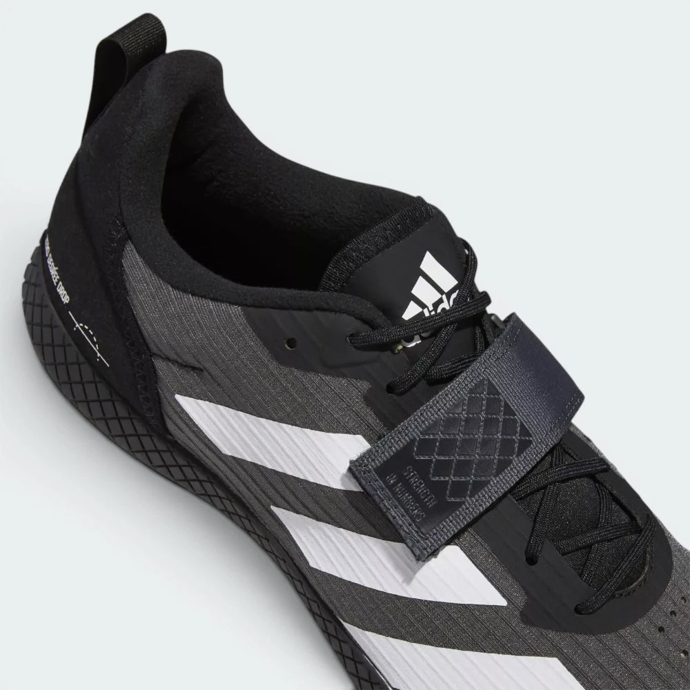 Details the high-definition space of the roomy toe box and the precision of the protective toe overlay.