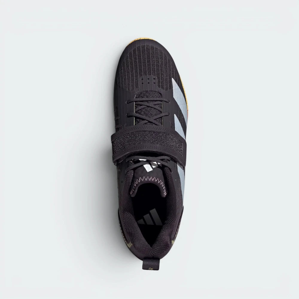 Focuses on the locked-in lace-and-strap combo layout, displaying the perfect symmetry of the canvas tongue, the heavy-duty hook-and-loop bridge overlay, and the clean unperforated weave guarding the front toe box area.