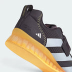 Highlights the "unreal" clean finish where the high-density non-compressible midsole carrier securely bonds to the low-profile gym rubber base.