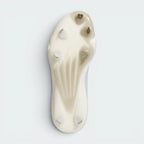 Displays the high-traction cleat arrangement on the synthetic outsole, showcasing the aggressive stud configuration engineered for unreal bite and dig on baseball clay and grass.