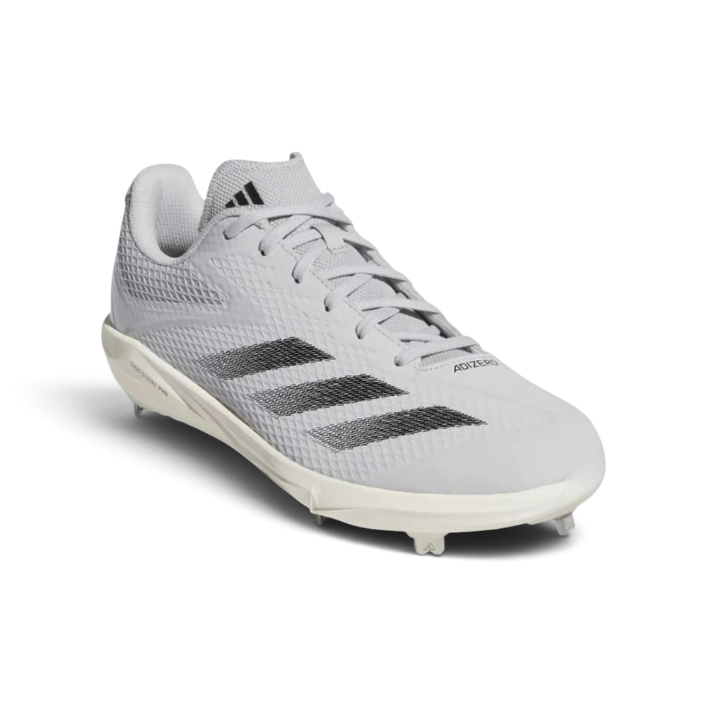 Emphasising the ultra-light, forward-leaning stance of the cleats and the sharp contrast between the light grey chassis and dark black branding.