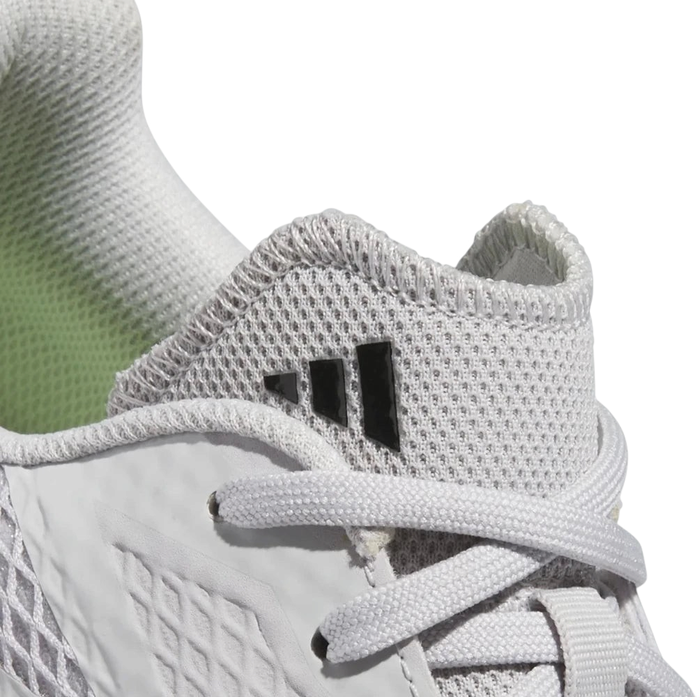 Details the precision of the synthetic drag-guard wrapping the front toe tip, showing off the clean lace tracking over the tongue.