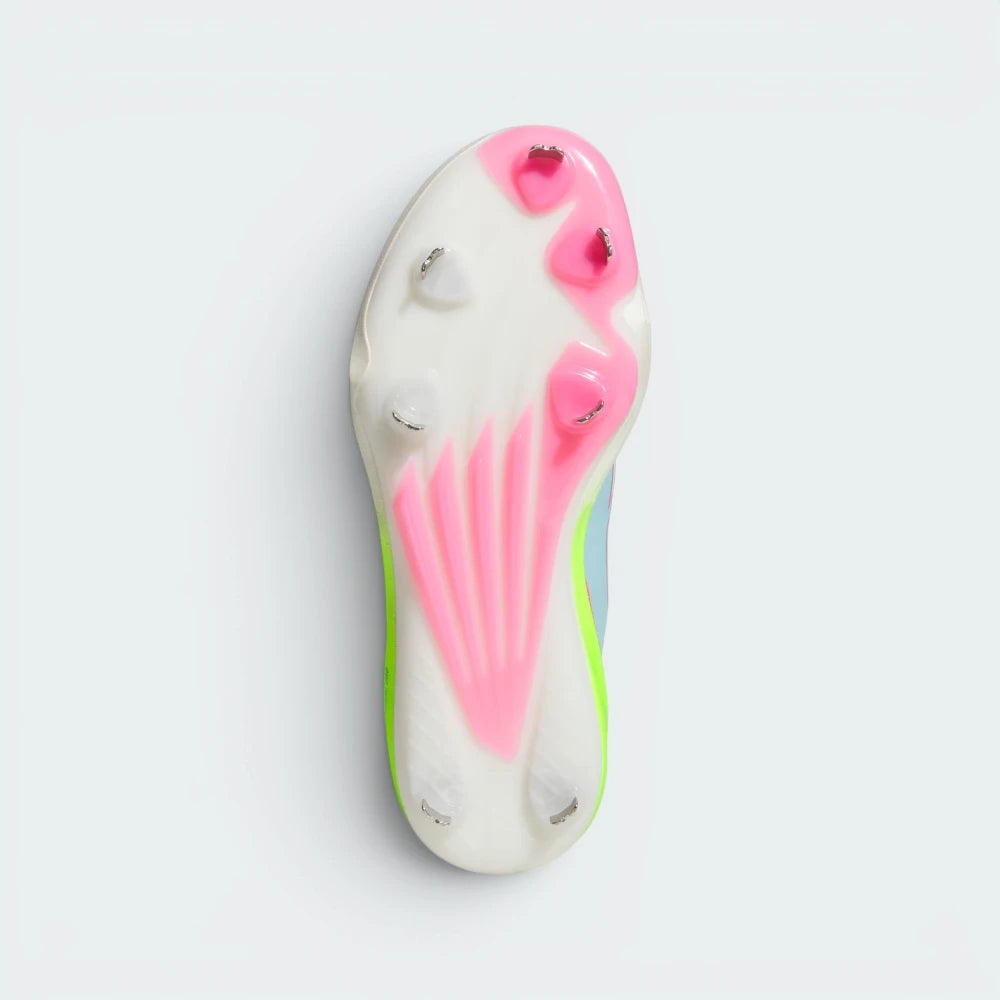 Displays the high-traction cleat arrangement on the synthetic outsole, showcasing the aggressive stud configuration engineered for unreal grip and dig on baseball clay and outfield grass.