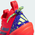 Highlights the "unreal" clean finish where the textured Lightstrike foam cushioning wall bonds securely to the high-traction synthetic plate.