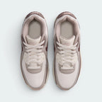 Focuses on the locked-in lace closure layout, the clean Phantom mesh over the toe box, and the branded tongue patches.